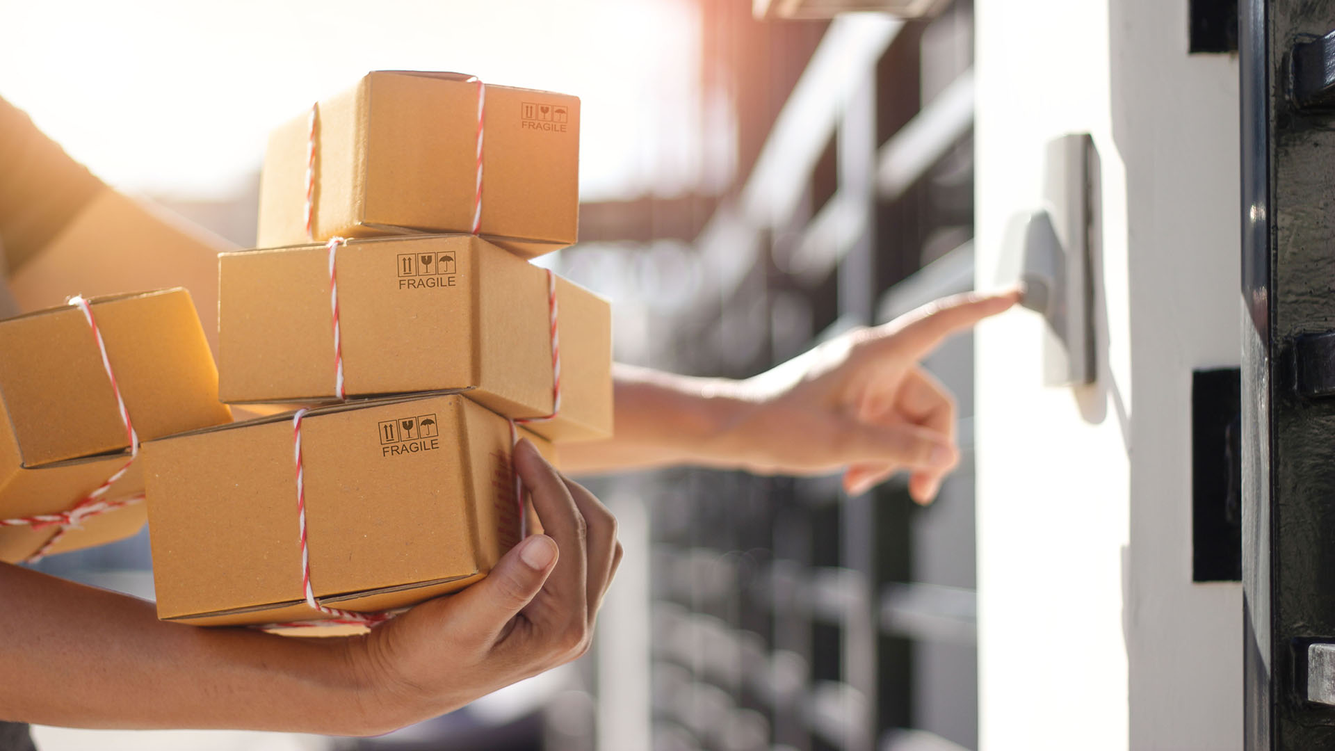 Person delivers packages to door, used to represent regular dividends from the retirement fund